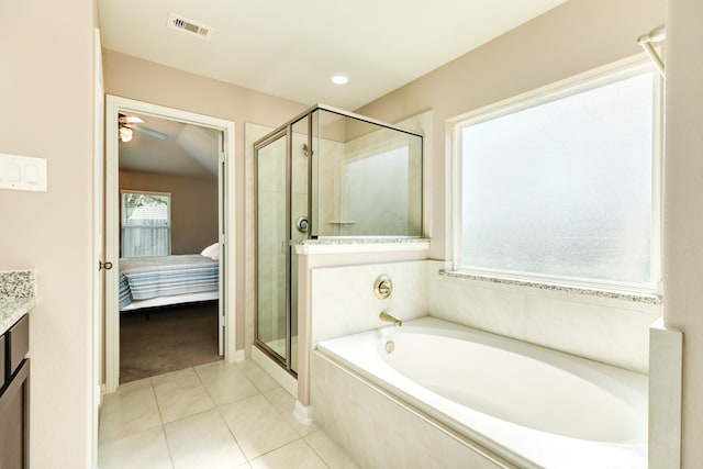 bathroom featuring tile patterned floors, separate shower and tub, vanity, and ceiling fan