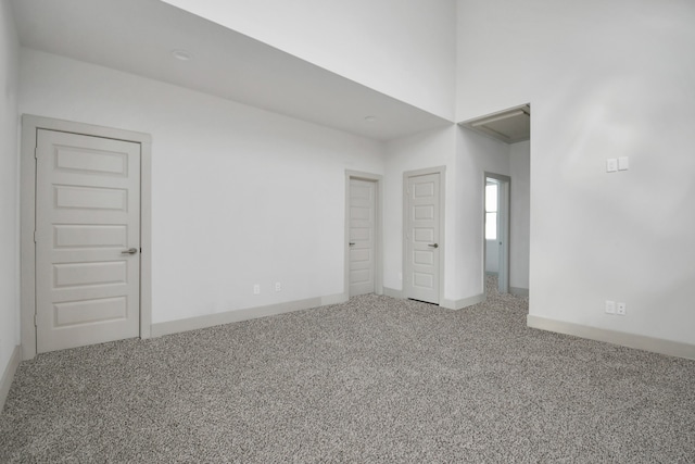 unfurnished bedroom with carpet flooring