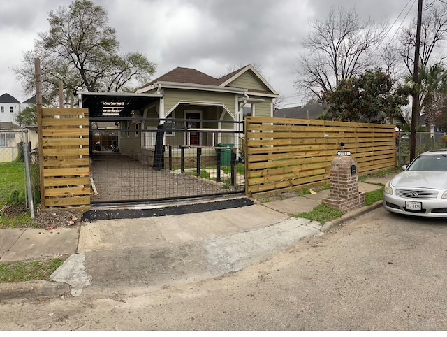 view of front of home with a carport