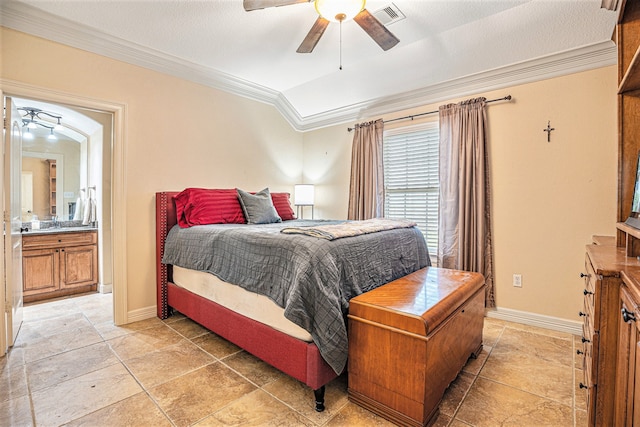 bedroom with ceiling fan, sink, crown molding, and ensuite bath