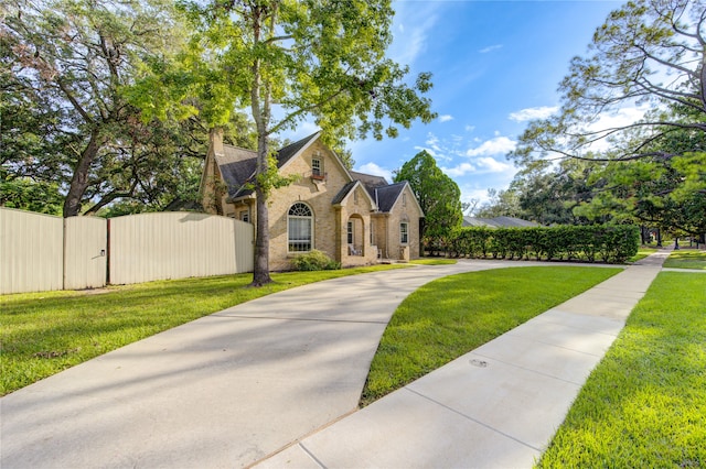 view of front of home with a front lawn