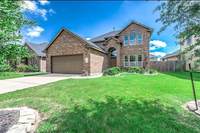 view of front facade featuring a front lawn and a garage