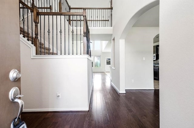 foyer entrance with hardwood / wood-style flooring