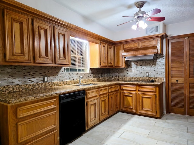 kitchen with backsplash, dark stone counters, black appliances, sink, and ceiling fan