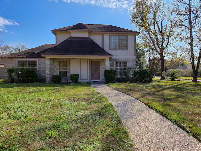 view of property with a front lawn