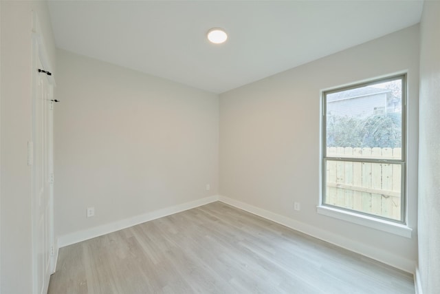 empty room featuring light hardwood / wood-style floors