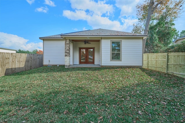 exterior space featuring ceiling fan, french doors, and a front yard