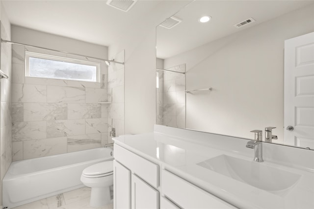 full bathroom with tiled shower / bath combo, toilet, and vanity