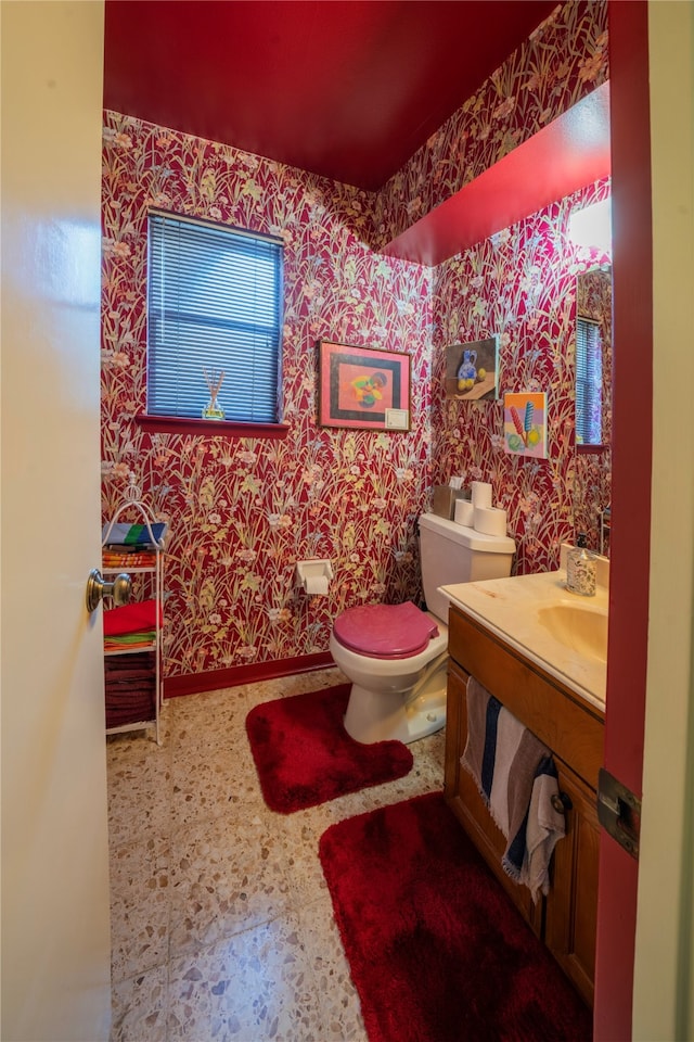 bathroom featuring toilet and sink