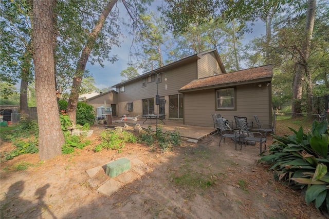 back of house featuring a patio area