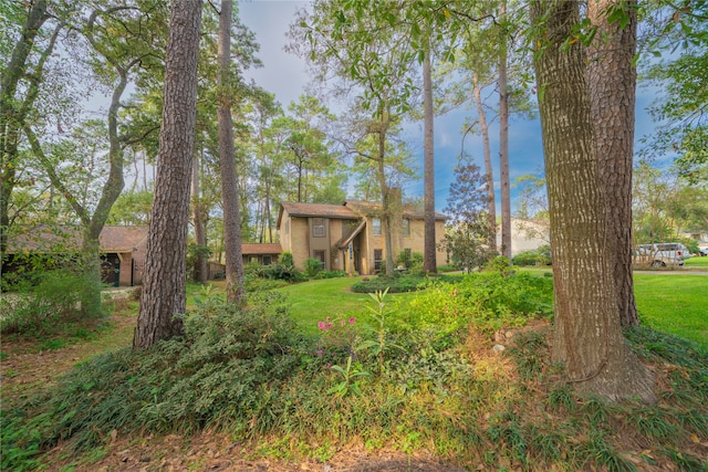 exterior space with a front lawn