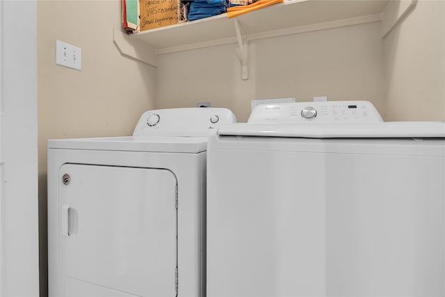 laundry area with washer and clothes dryer