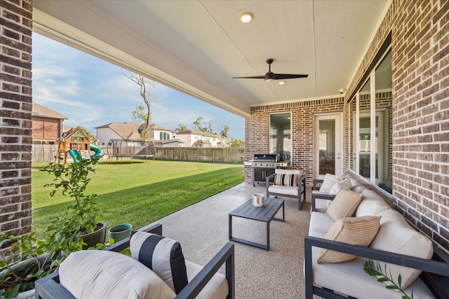 view of patio / terrace featuring grilling area, outdoor lounge area, a playground, and a trampoline