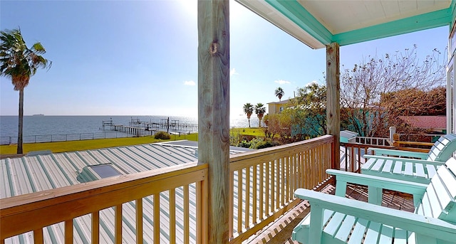 balcony featuring a water view