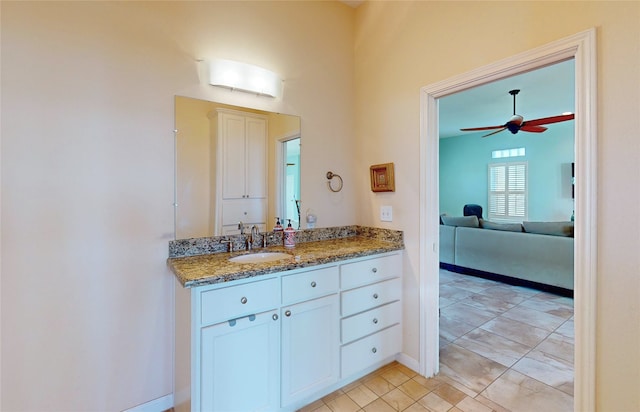 bathroom featuring ceiling fan and vanity