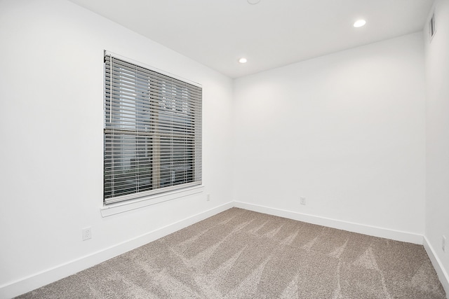 empty room with carpet floors