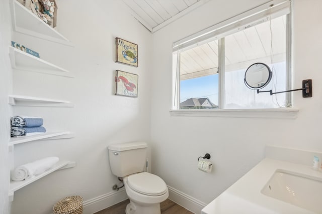 bathroom featuring vanity, lofted ceiling, wooden ceiling, toilet, and wood-type flooring