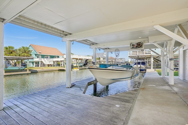 dock area with a water view