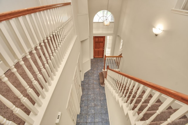 stairway with a high ceiling