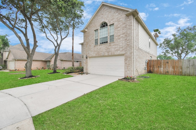 front of property with a garage and a front lawn