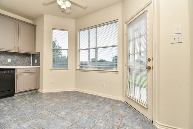 doorway featuring light tile patterned floors and ceiling fan