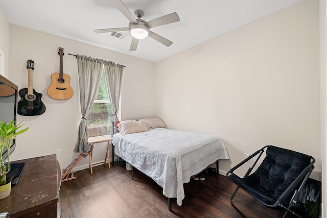 5907 Wedgefield St, Houston, TX 77028 - bedroom featuring wood finished floors, baseboards, and a ceiling fan