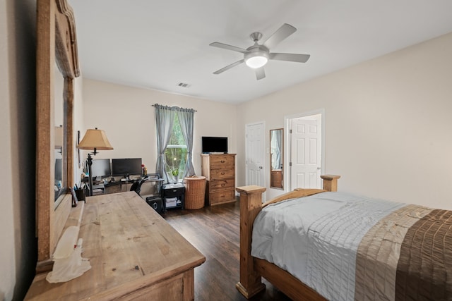 5907 Wedgefield St, Houston, TX 77028 - bedroom featuring dark wood-style flooring and a ceiling fan