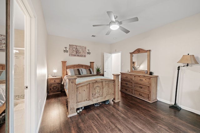 5907 Wedgefield St, Houston, TX 77028 - bedroom featuring dark wood-style floors, baseboards, and ceiling fan