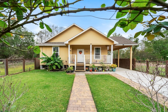 bungalow featuring a front yard and a porch