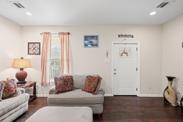 5907 Wedgefield St, Houston, TX 77028 - living room with wood finished floors, baseboards, and recessed lighting