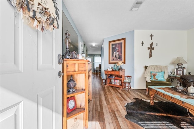 foyer entrance featuring hardwood / wood-style flooring