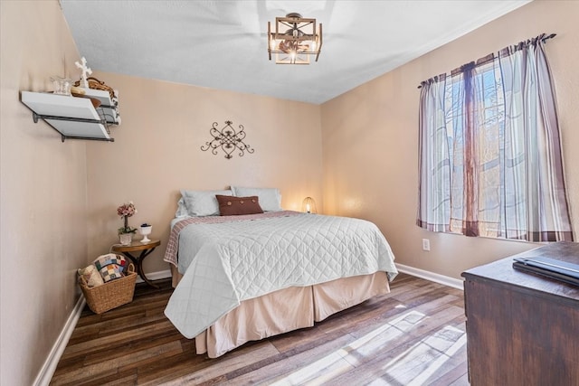 bedroom featuring dark wood-type flooring