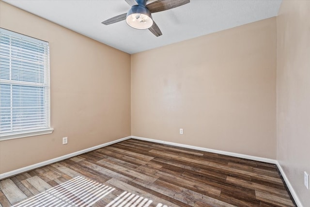 empty room with hardwood / wood-style flooring