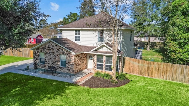 front of property featuring a front lawn