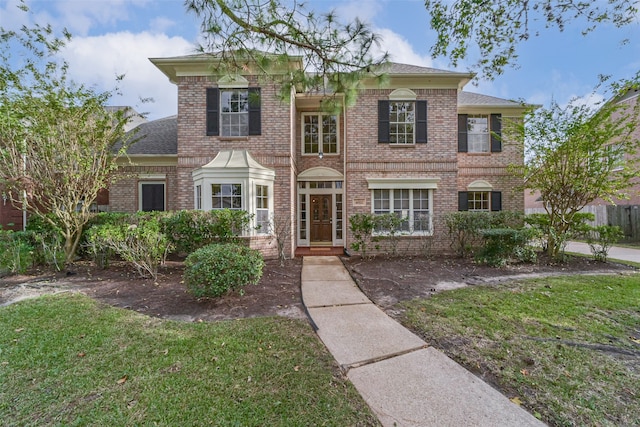 view of front facade with a front yard