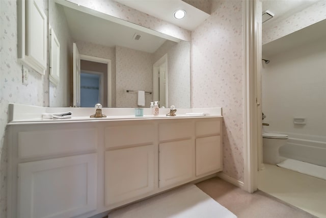 bathroom featuring vanity and washtub / shower combination