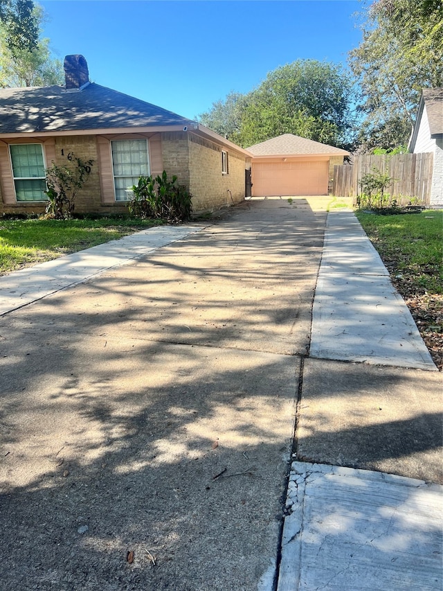 view of property exterior with a garage