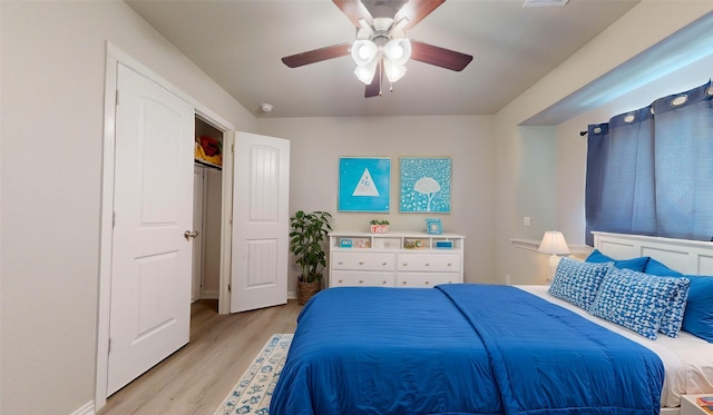 bedroom featuring ceiling fan and light wood-type flooring