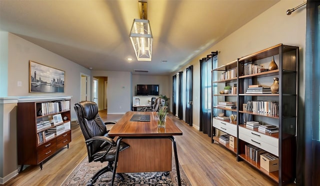 office featuring light hardwood / wood-style flooring