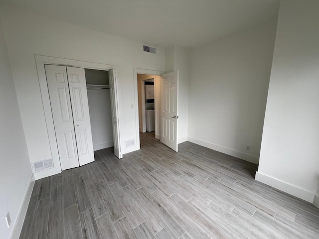 unfurnished bedroom featuring a closet