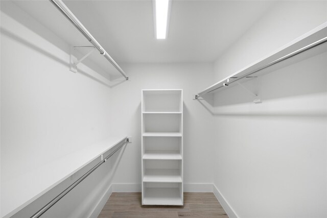 2001 Holcombe Blvd Unit 705, Houston, TX 77030 - walk in closet with wood finished floors