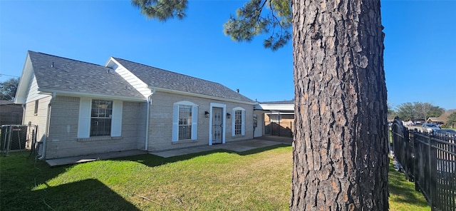 exterior space featuring a front lawn