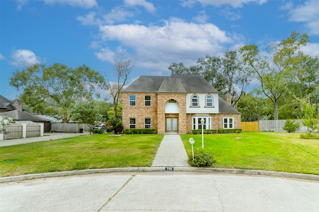 view of front facade with a front yard