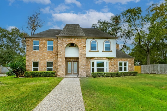 view of front of home with a front lawn