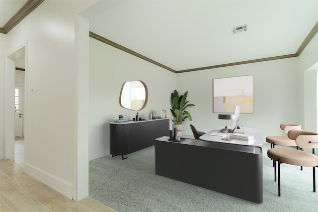 office area featuring ornamental molding and light colored carpet