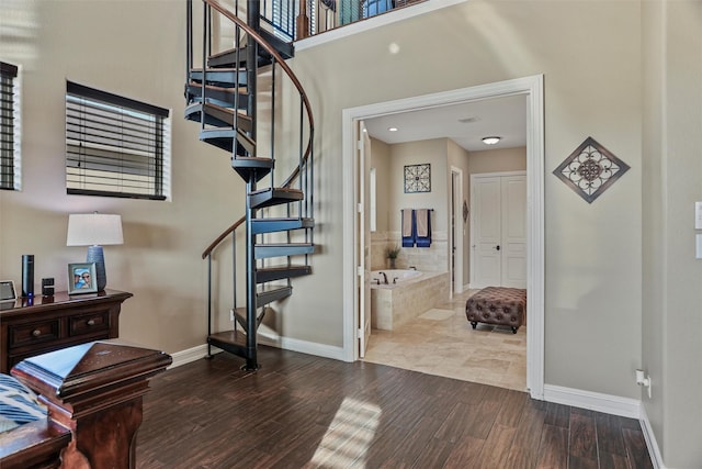 foyer entrance with wood-type flooring