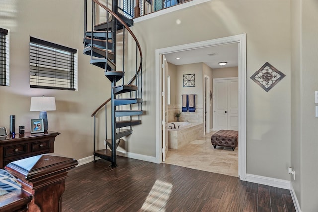 729 Pegasus Ln, League City, TX 77573 - stairs featuring baseboards and wood finished floors