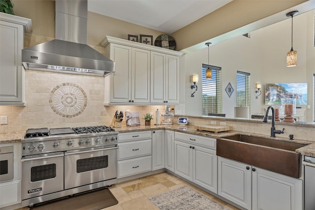 729 Pegasus Ln, League City, TX 77573 - kitchen with backsplash, wall chimney exhaust hood, a sink, and range with two ovens