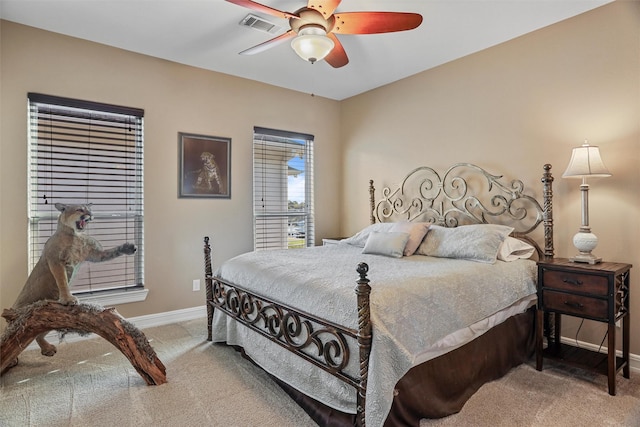 729 Pegasus Ln, League City, TX 77573 - carpeted bedroom featuring baseboards, visible vents, and ceiling fan