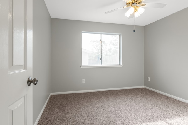 spare room with carpet flooring and ceiling fan